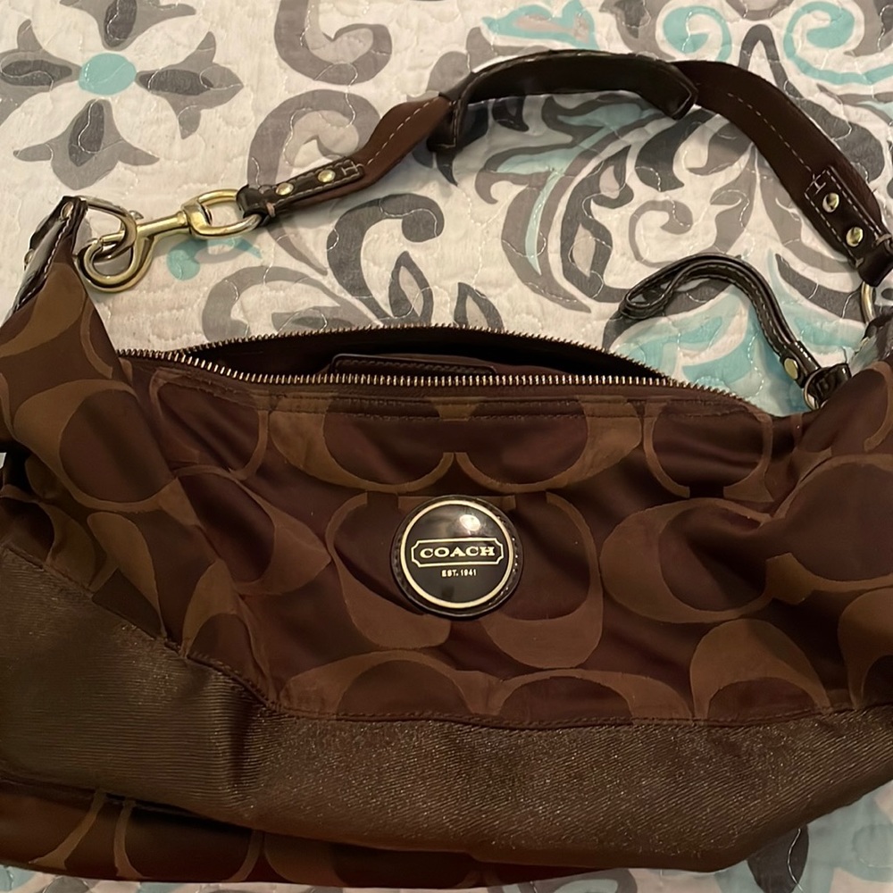 Small brown coach purse.